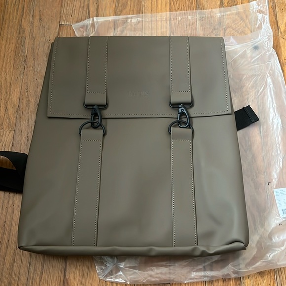 RAINS Other - RAINS MSN BAG. NEW IN BAG  COLOR IS WOOD